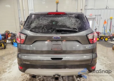 2018 Ford Escape Titanium z USA, uszkodzony, nr VIN 1FMCU9J9XJUB41098